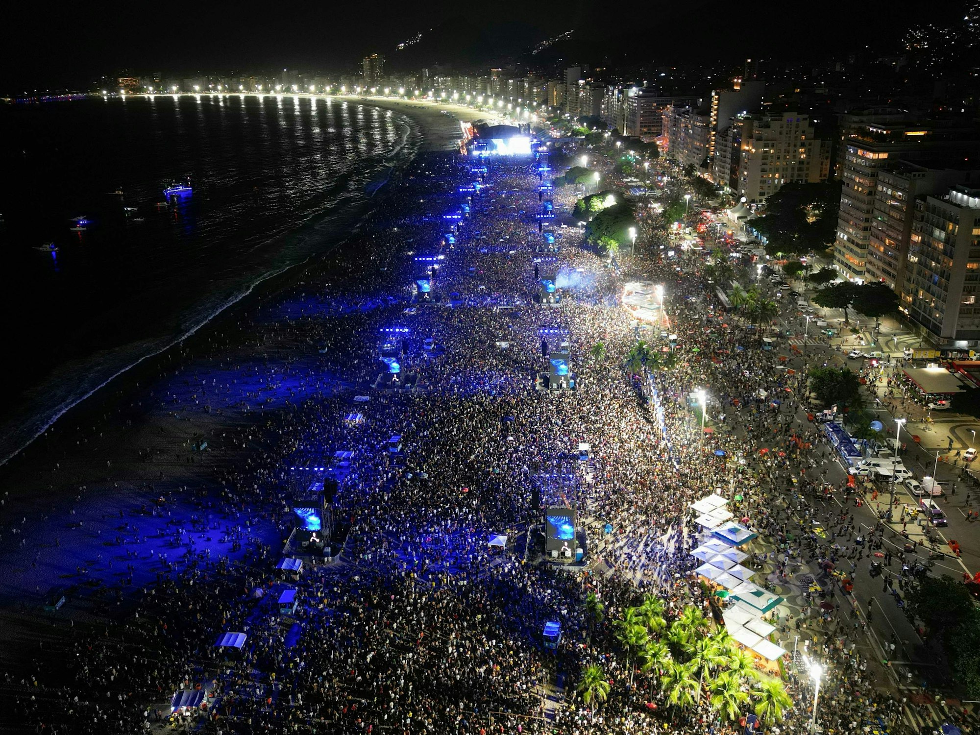 This aerial view shows Colombian singer Shakira performing during a free concert at Copacabana Beach in Rio de Janeiro, Brazil, on May 2, 2026. (Photo by Mauro PIMENTEL / AFP)