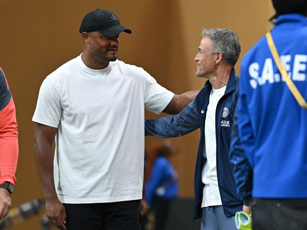 Vincent Kompany (l.) und PSG-Trainer Luis Enrique.