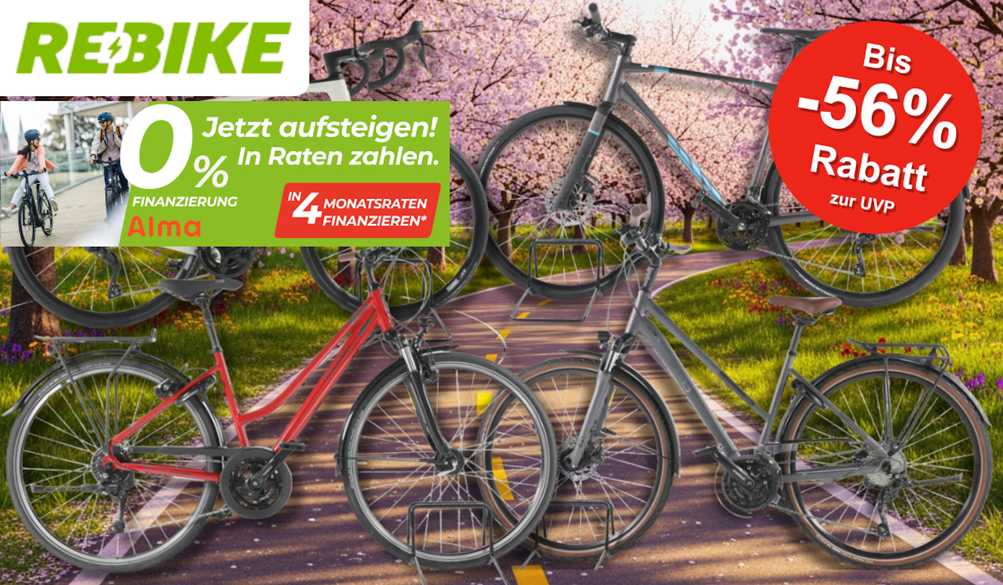 4 Fahrräder vor einem Radweg im Frühling mit blühenden Bäumen.