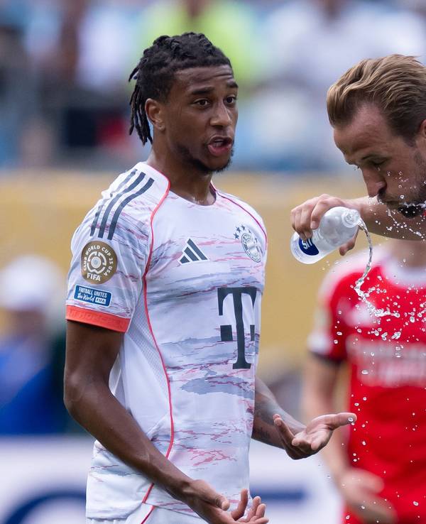 Michael Olise (l) und Harry Kane
