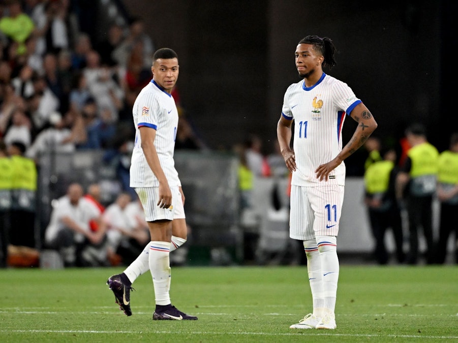Kylian Mbappé (l) und Michael Olise