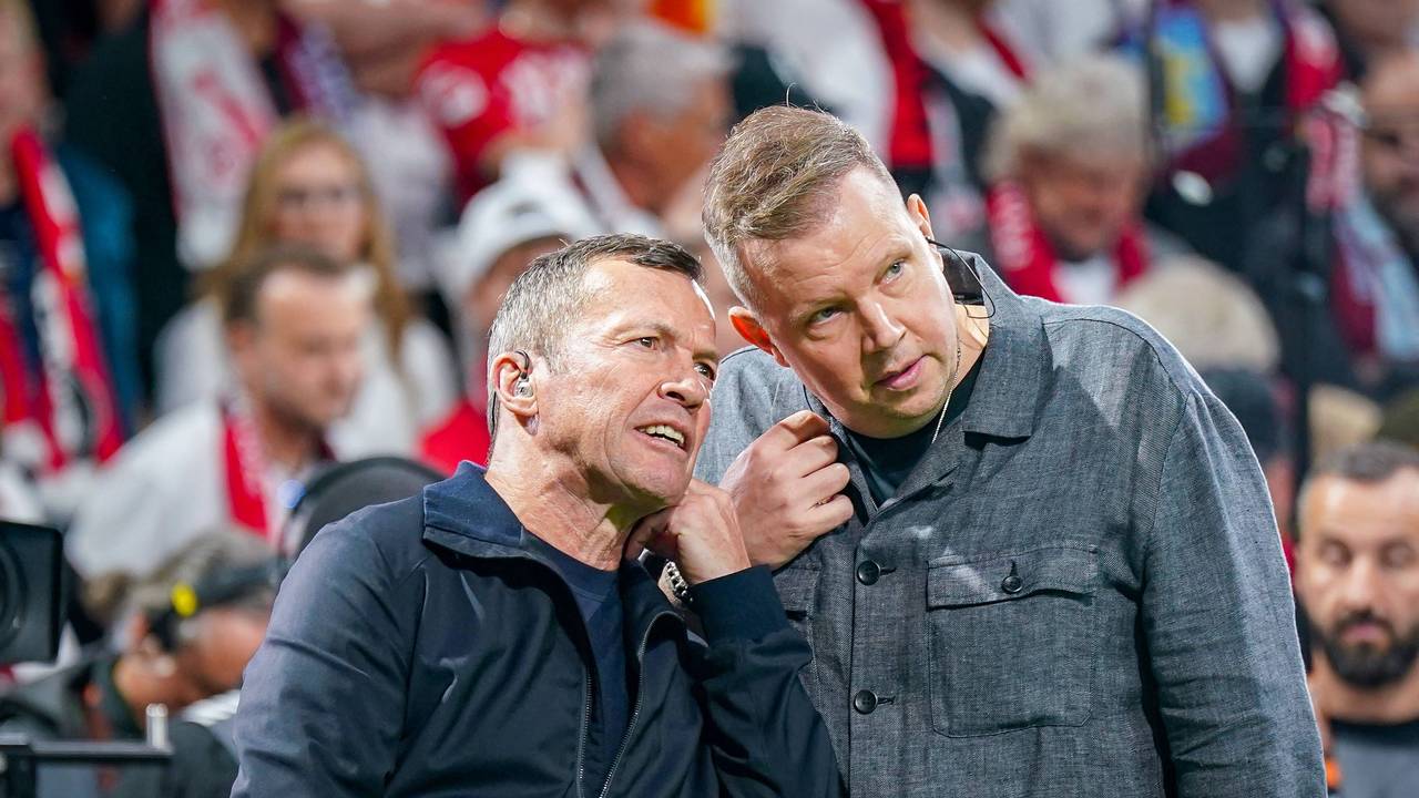 Wolff Fuss und Lothar Matthäus stecken die Köpfe zusammen.