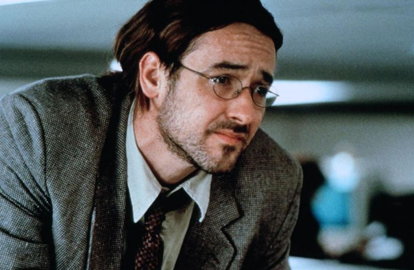 Spike Jonzes skurriler Kultfilm „Being John Malkovich“ (1999) markierte den künstlerischen Höhepunkt von Cusacks Laufbahn. Seine Hauptrolle machte ihn endgültig auch zum Kritikerliebling. (Bild: Universal Pictures)