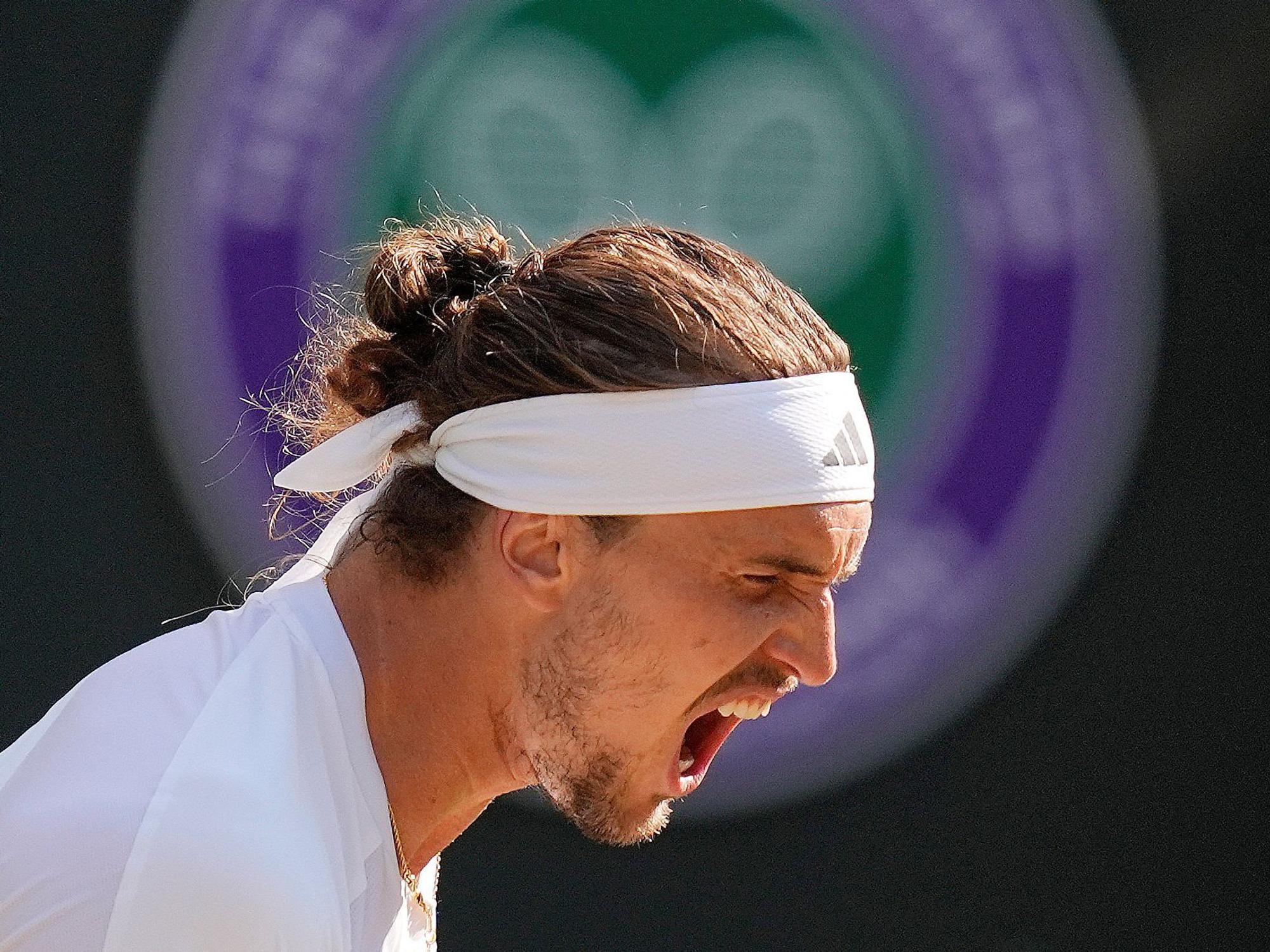 Alexander Zverev reagiert nach einem Punktgewinn beim Grand Slam in Wimbledon.