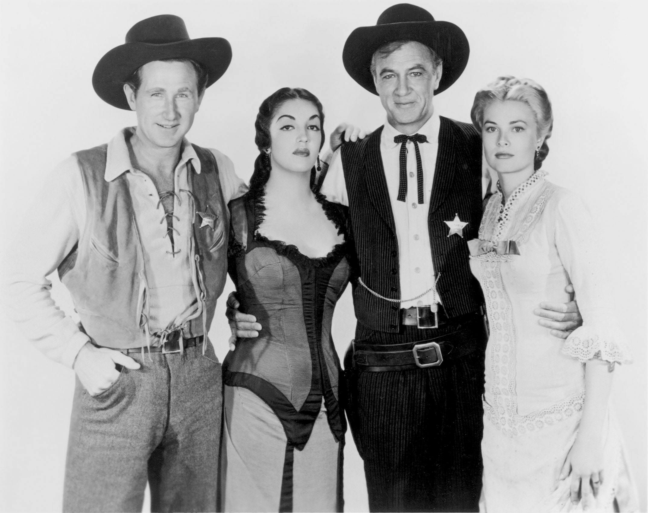 Lloyd Bridges, Katy Jurado, Gary Cooper und Grace Kelly in einer Szene aus dem Westernklassiker „Zwölf Uhr mittags“.