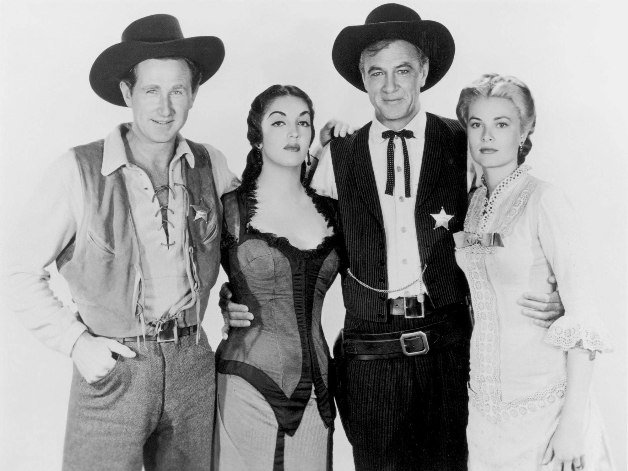Lloyd Bridges, Katy Jurado, Gary Cooper und Grace Kelly in einer Szene aus dem Westernklassiker „Zwölf Uhr mittags“.
