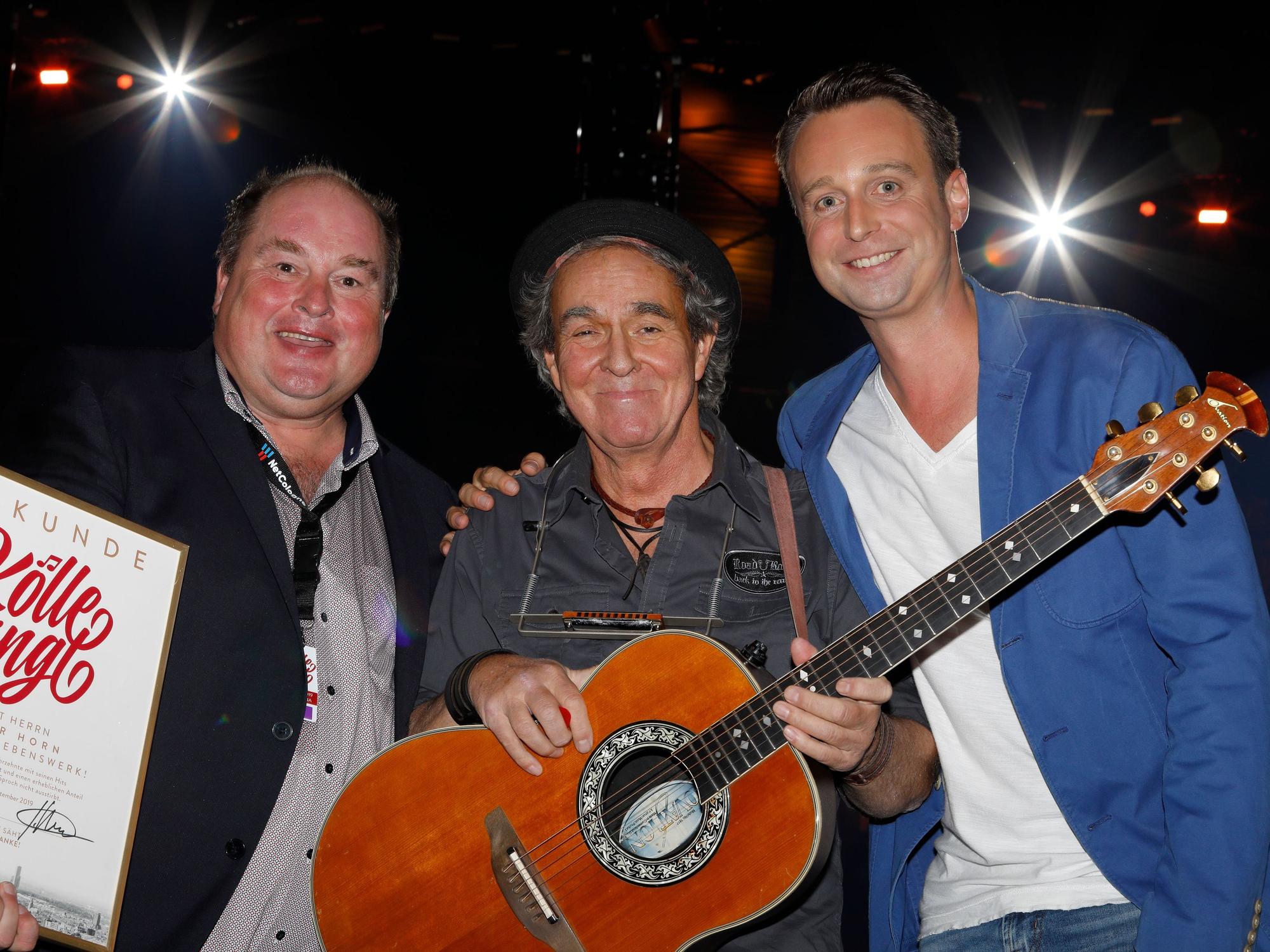 Stephan Brandt, Peter Horn und Lukas Wachten stehen auf der Bühne.