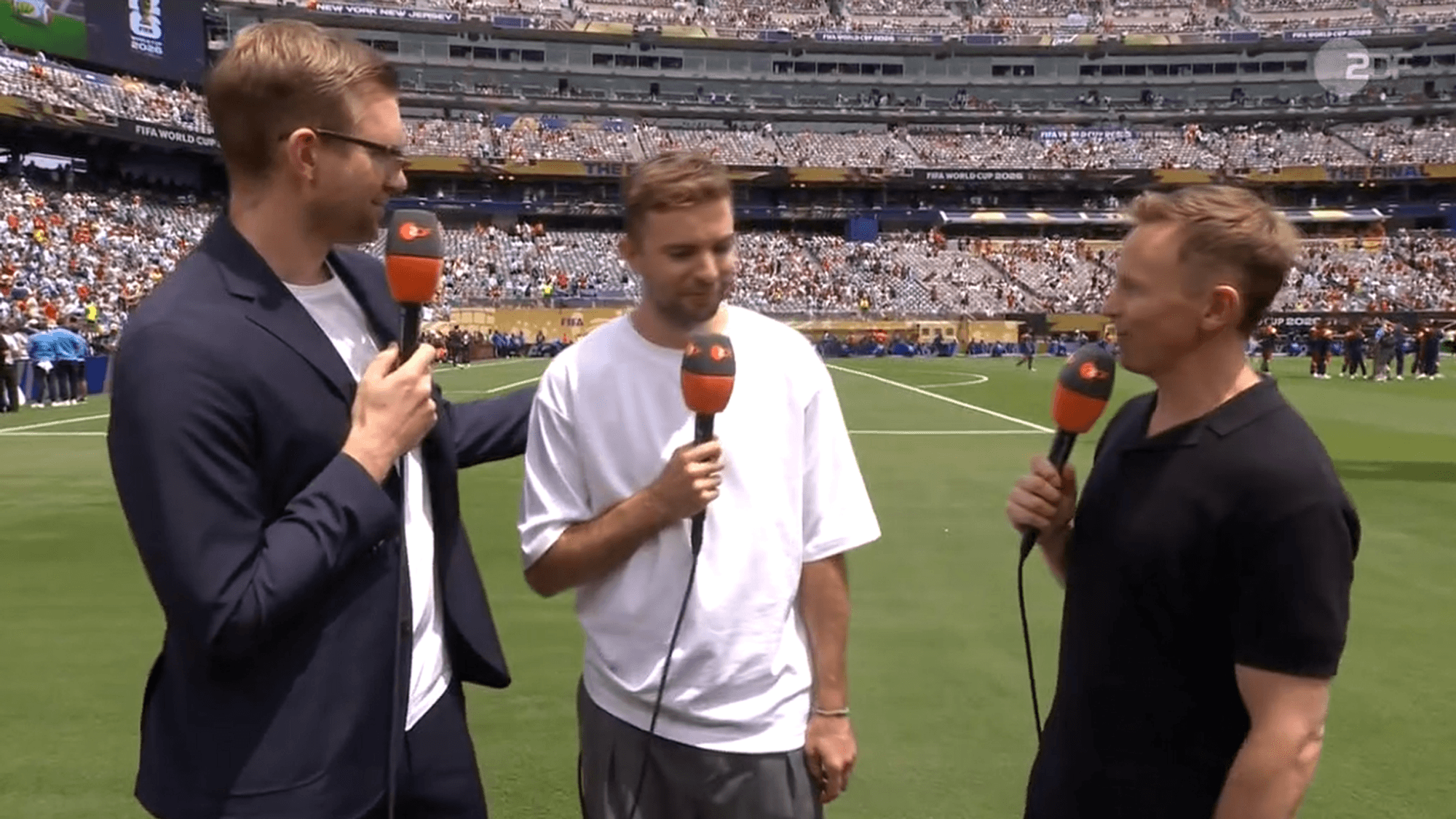 Per Mertesacker, Christoph Kramer und Jochen Breyer in New York im WM-Finalstadion. Foto: Screenshot ZDF