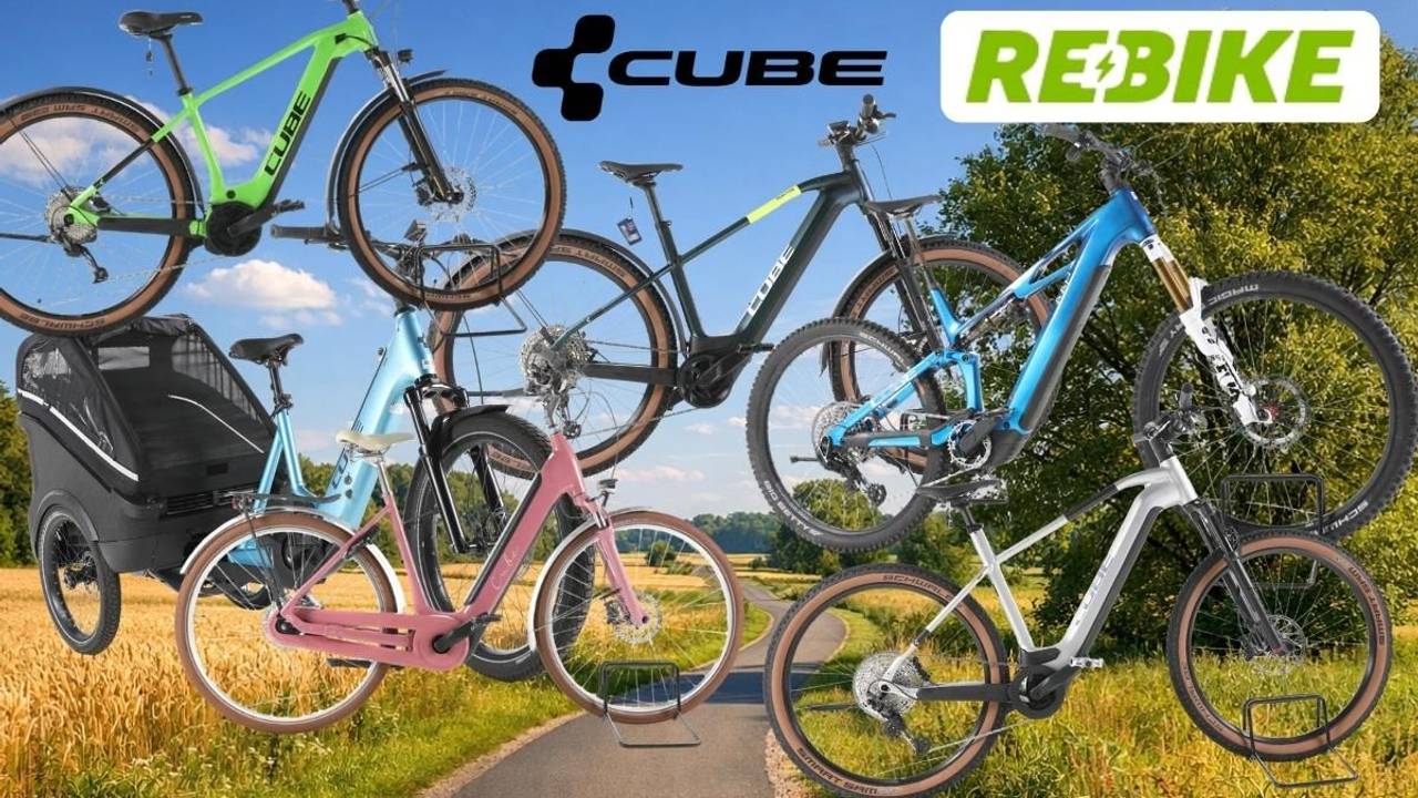Cube E-Bikes, City Bikes, Mountainbikes, Lastenrad vor einer Landstraße im Grünen mit Bäumen, Wald und Wiesen im Hintergrund und blauem Himmel.