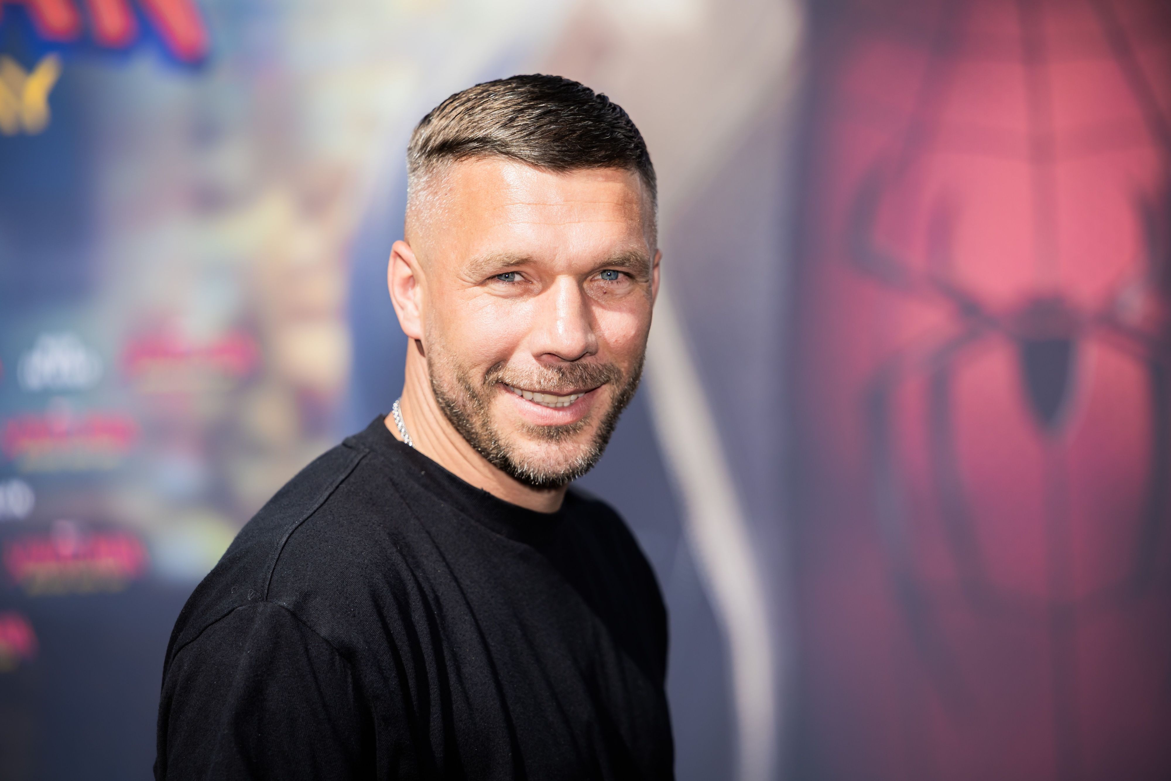 Lukas Podolski kommt zum Fan-Event „Spider-Man: Brand New Day“.