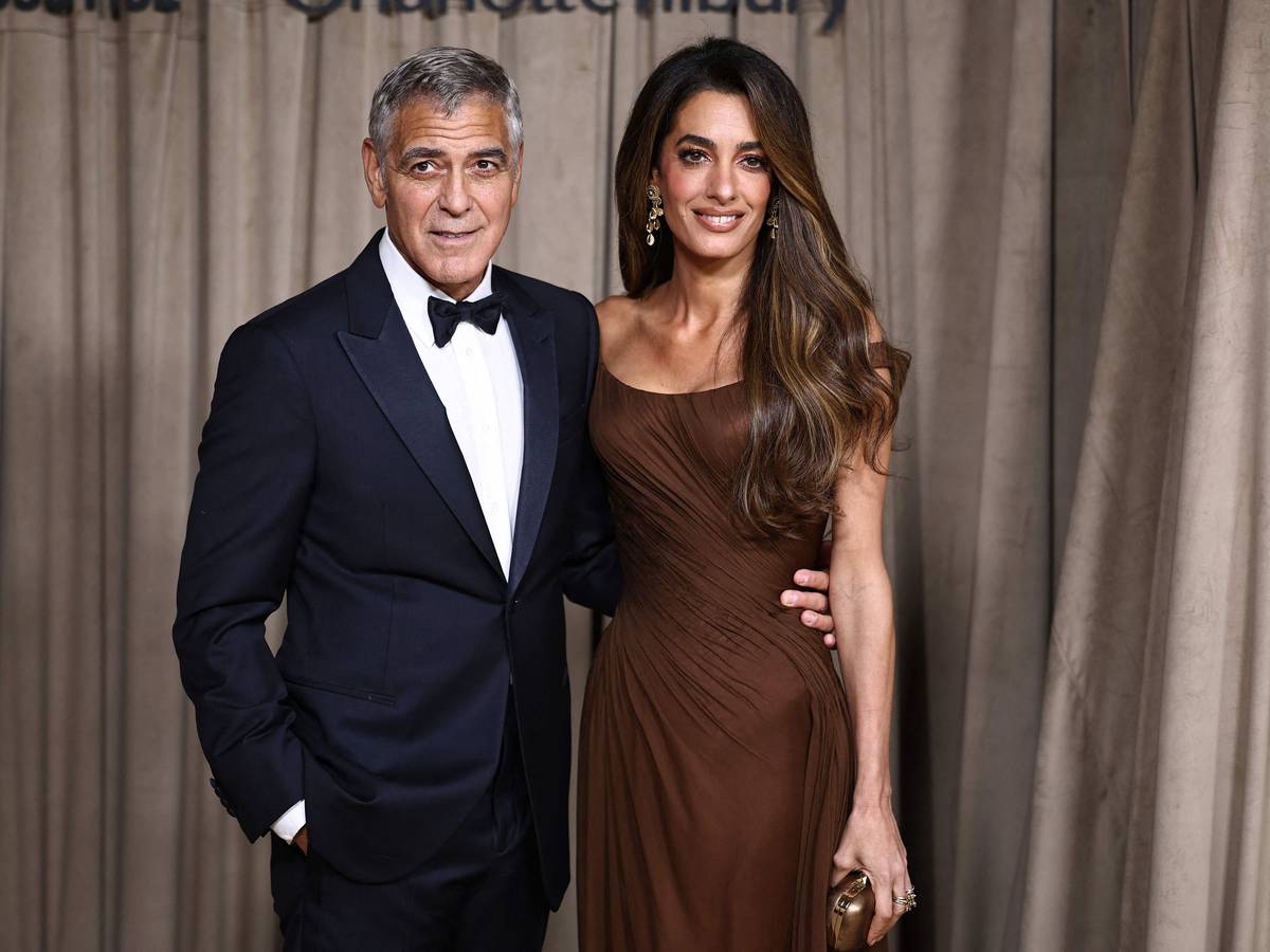 George Clooney und seine Ehefrau Jamal auf dem roten Teppich.