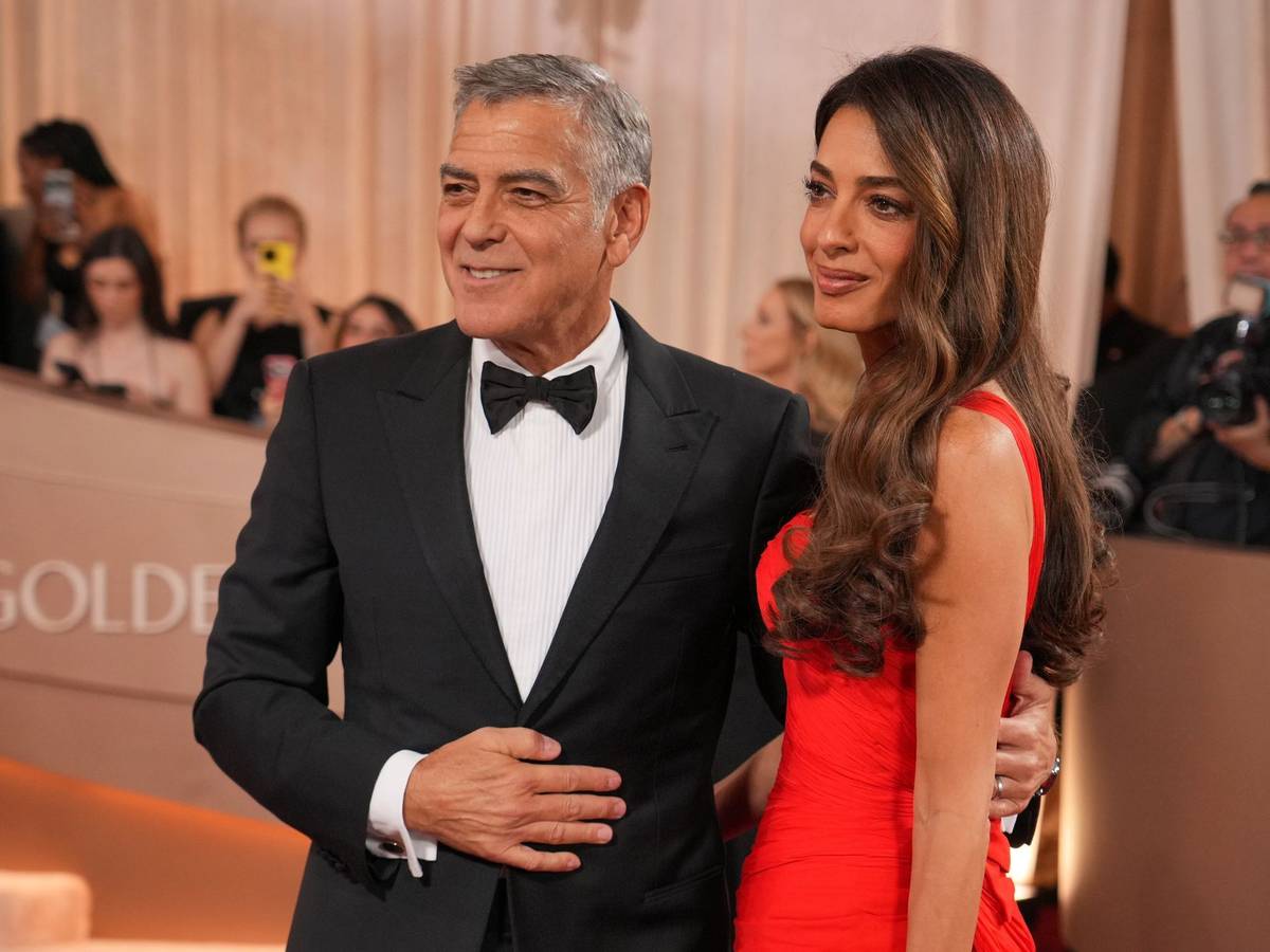 George Clooney und seine Ehefrau Jamal auf dem roten Teppich.