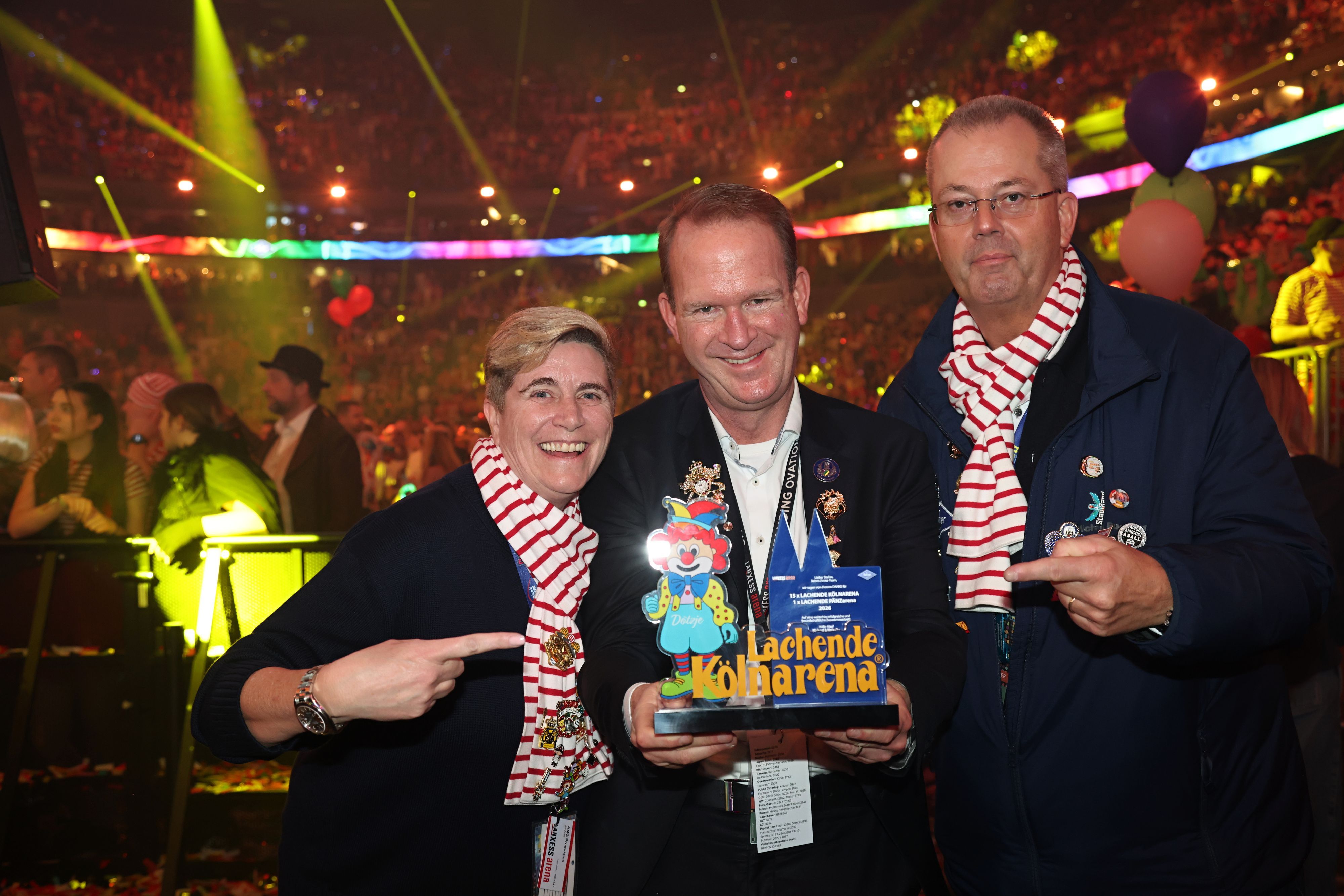 Nathalie Drmota, Stefan Löcher und Michael Burgmer in der Lachenden Kölnarena.