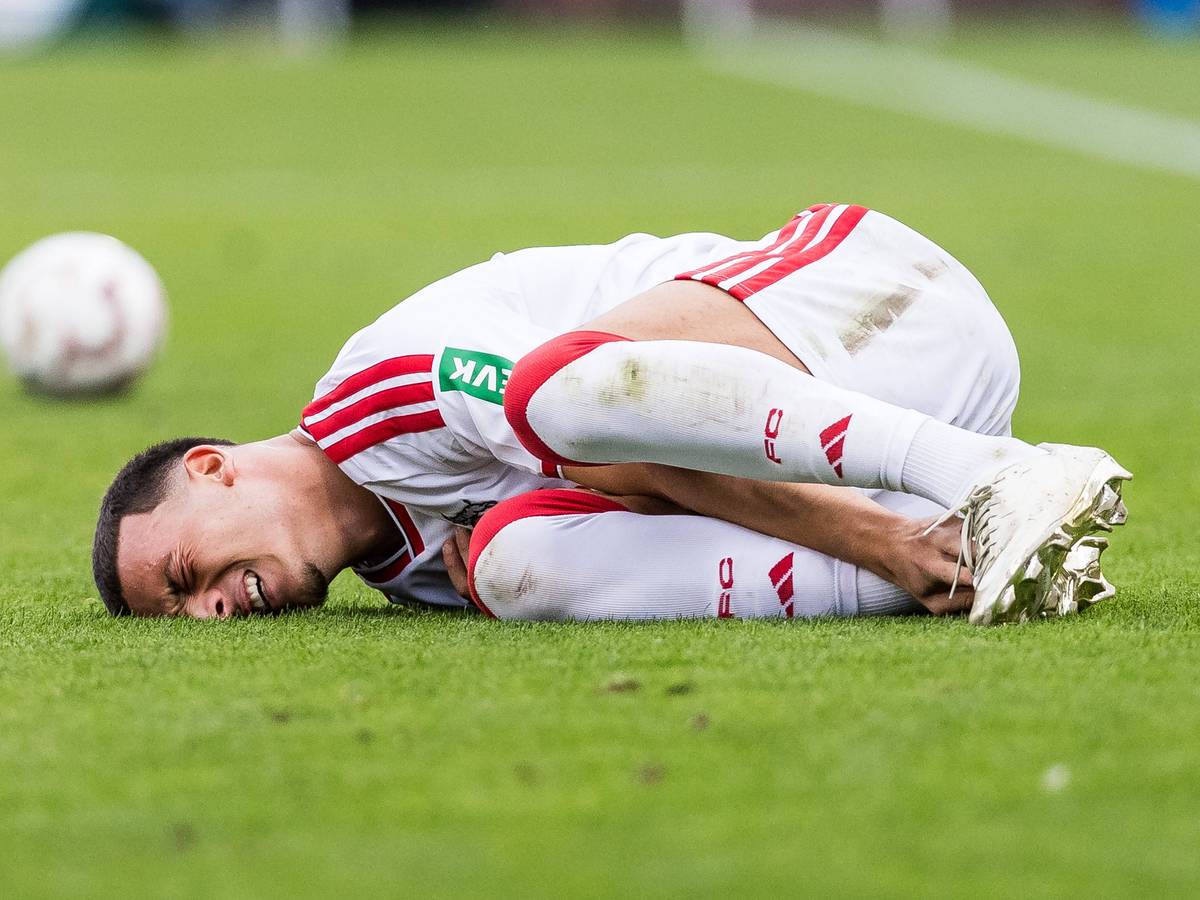 Said El Mala liegt mit schmerzverzerrtem Gesicht auf dem Boden.