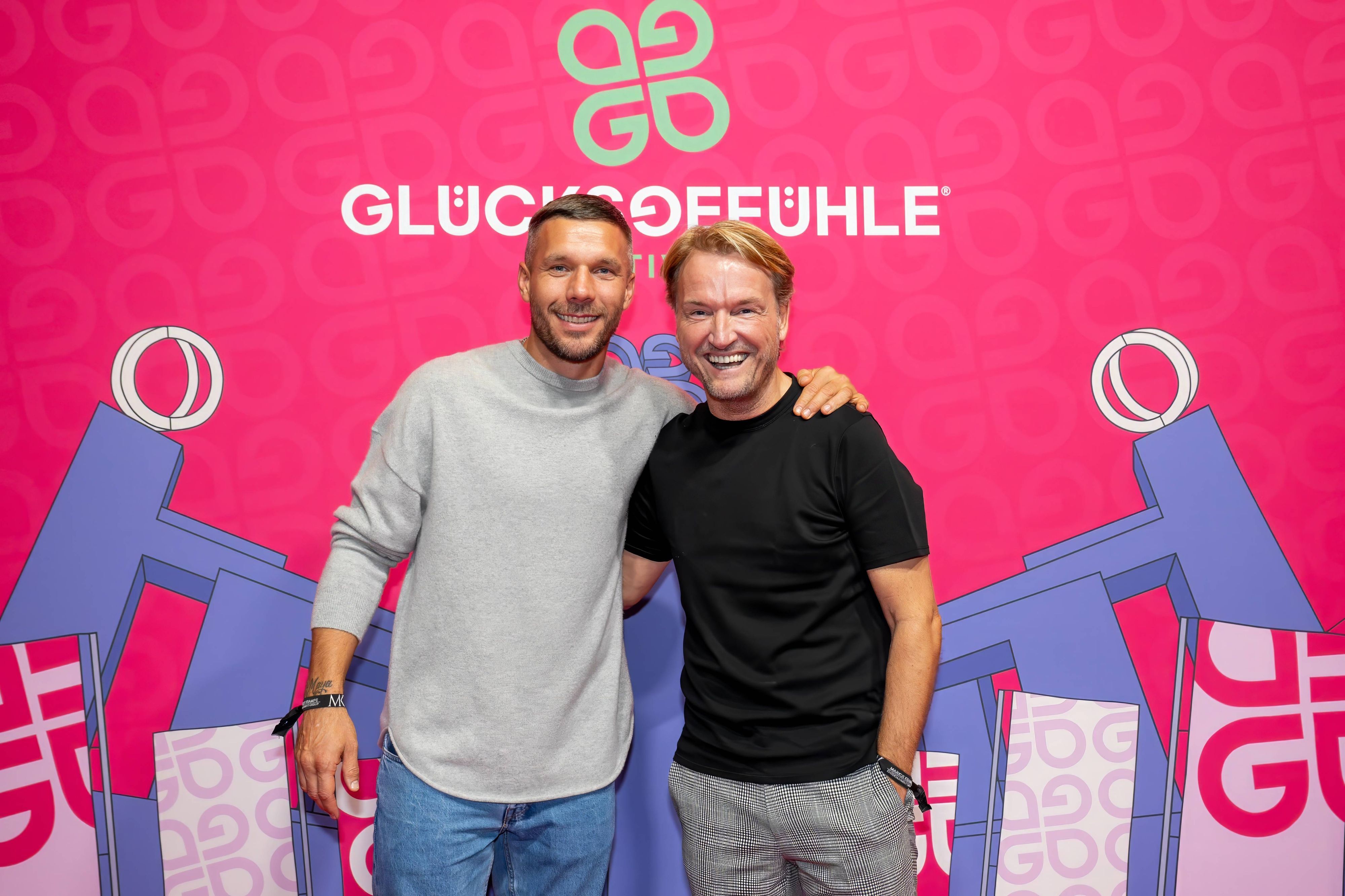 Lukas Podolski und Markus Krampe beim Event des Glücksgefühle-Festivals.