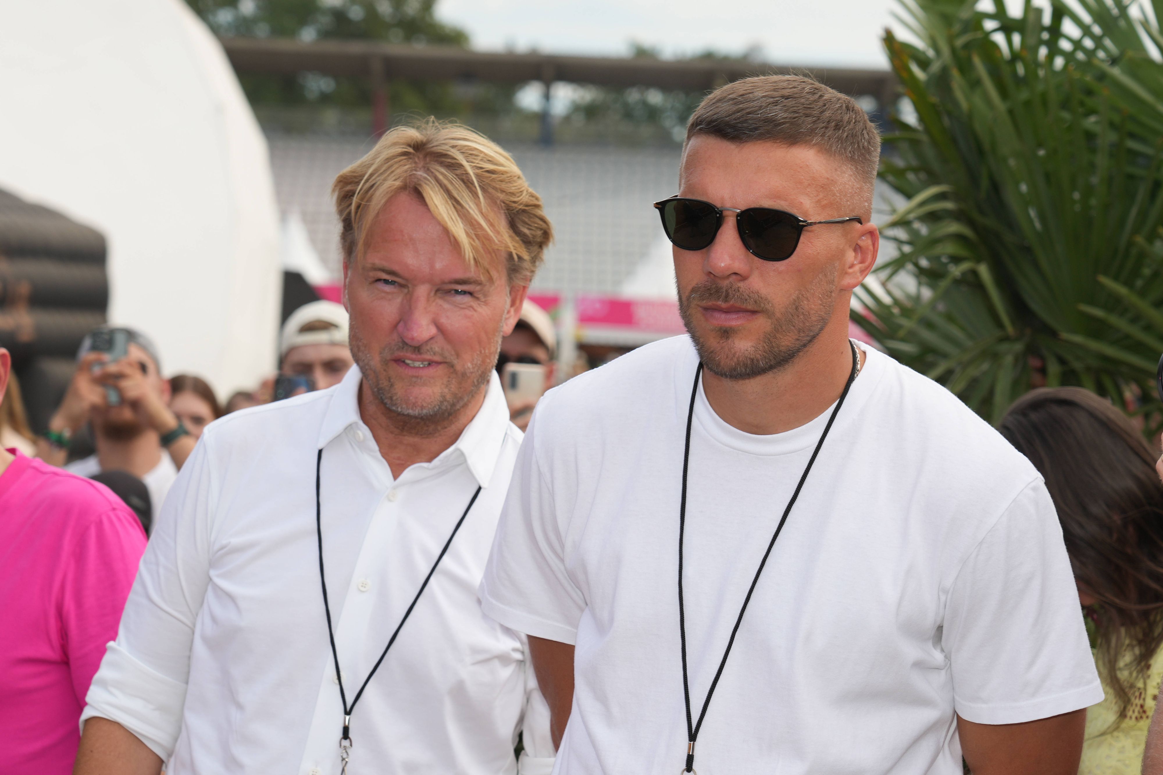 Markus Krampe und Lukas Podolski beim Glücksgefühle-Festival.