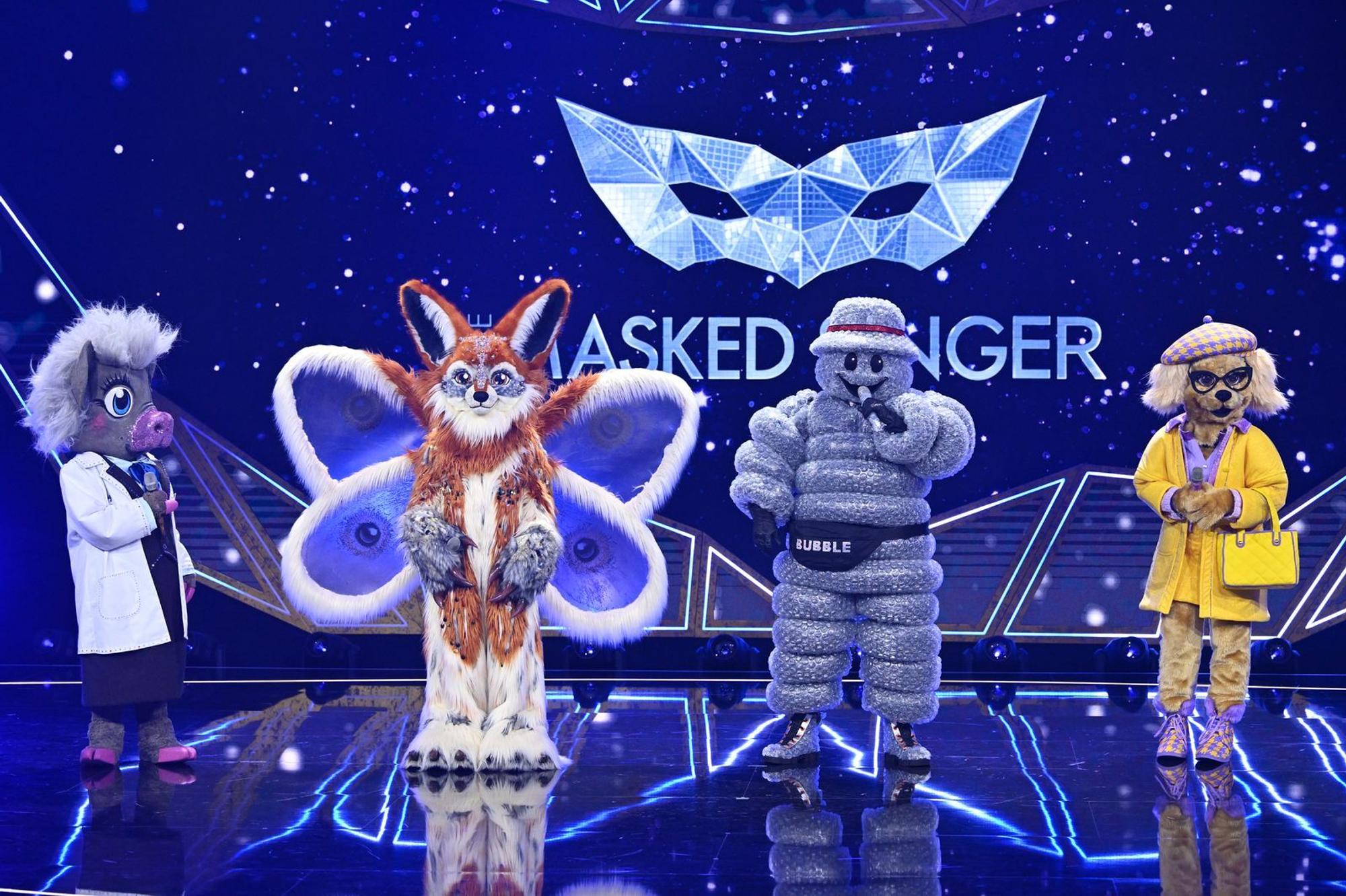 Sie singen und tanzen wieder, aber ein bisschen anders. In der ersten Show von „The Masked Singer“ (ProSieben) traten Prof. Dr. Dr Schweinstein, Momo, Bubble und Emily Wau (von links) auf. Für zwei von ihnen war der „Maskenball“ gleich wieder beendet. (Bild: Joyn/Willi Weber)