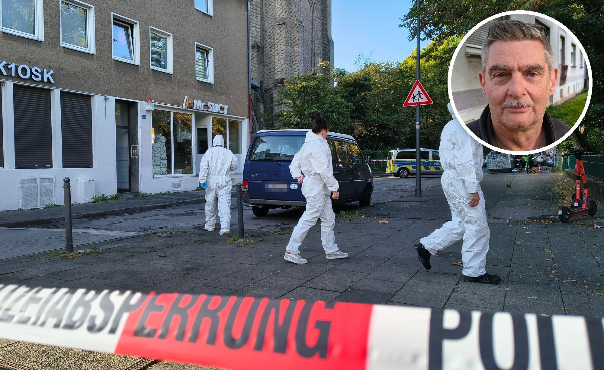 Die Polizei ist am Freitagmorgen in Köln-Mülheim im Einsatz. Zuvor hatte es Schüsse auf ein Wohnhaus mit Pizzeria im Erdgeschoss gegeben.