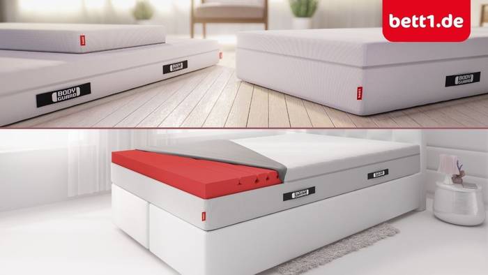 Mehrere BODYGUARD-Matratzen von bett1.de nebeneinander sowie eine Matratze auf einem Boxspringbett mit sichtbarem rotem Kaltschaum-Kern im Querschnitt, oben rechts das Logo von bett1.de