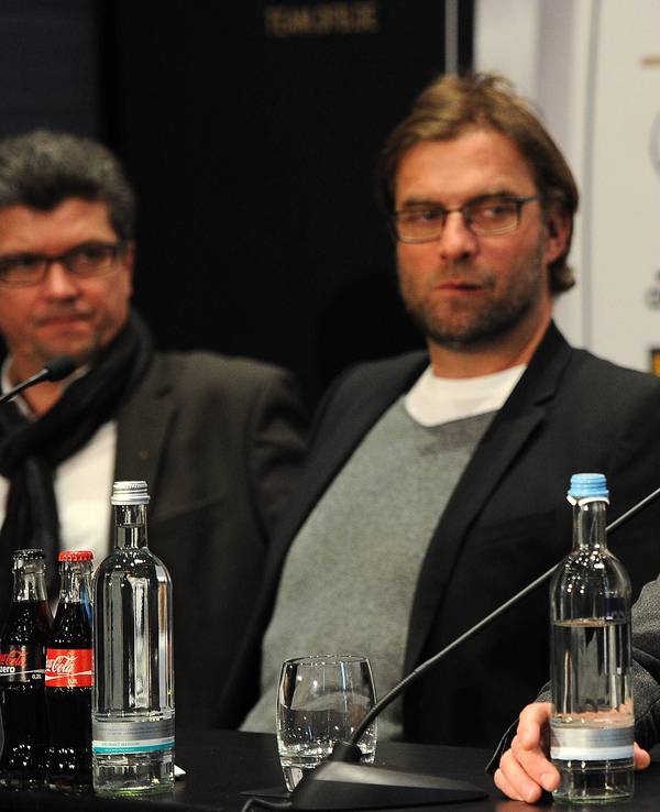 DFB-Tagung mit Bundesliga-Cheftrainern: Herbert Fandel (Schiedsrichter-Chef), Jürgen Klopp (Trainer Dortmund) und Joachim Löw bei einer Pressekonferenz.