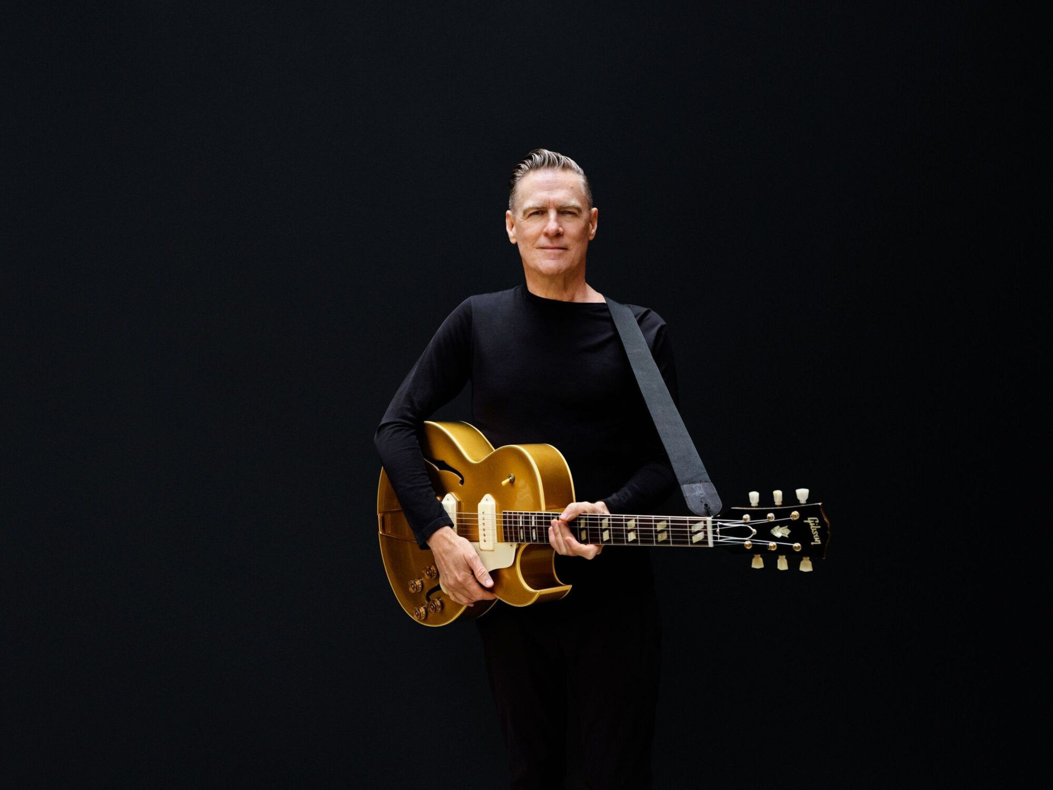 Bryan Adams mit seiner Gitarre.