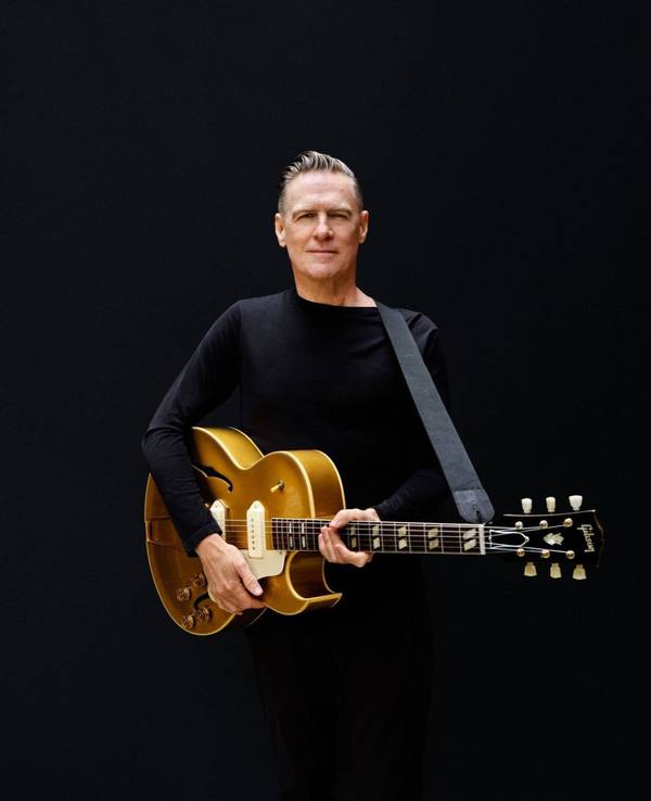 Bryan Adams mit seiner Gitarre.