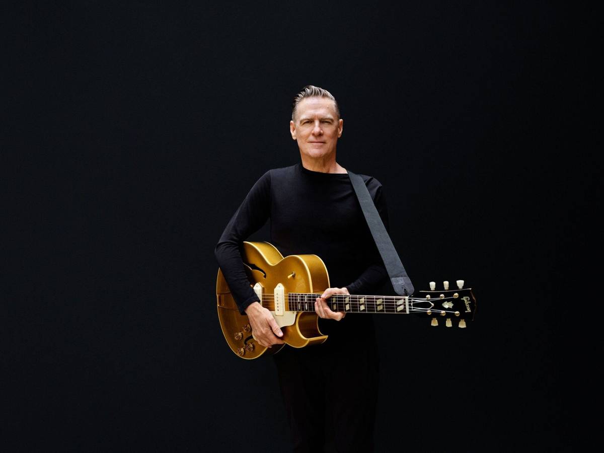 Bryan Adams mit seiner Gitarre.