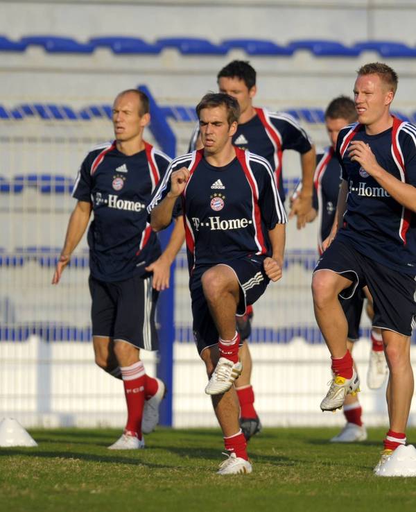 Arjen Robben, Philipp Lahm (Mitte) und Christian Lell (r.) beim Training.