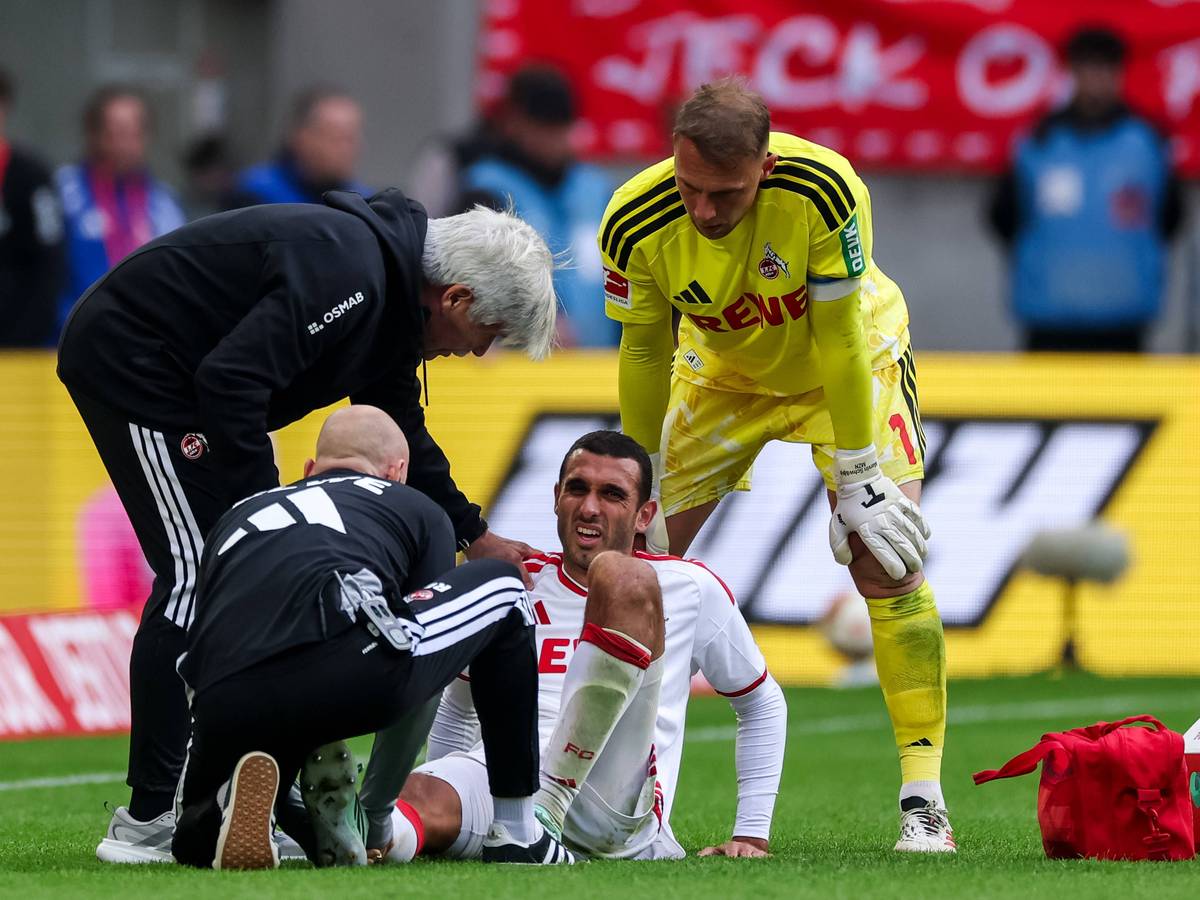 Ellyes Skhiri sitzt verletzt auf dem Boden.