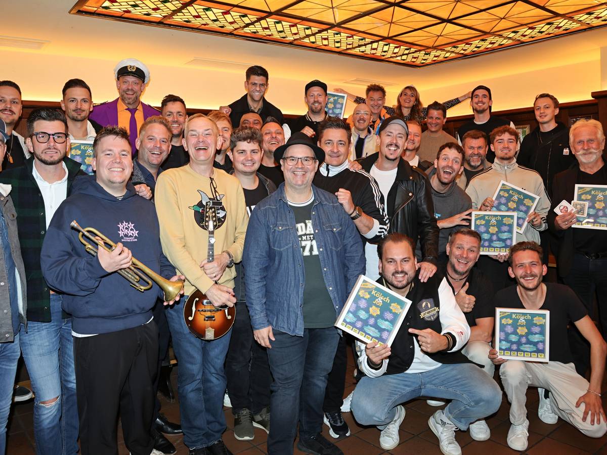 Gruppenbild der Musiker zur Sampler-Präsentation „Kölsch & Jot – Top Jeck 2027“.