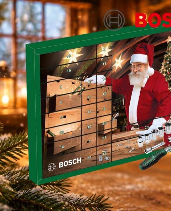 Bosch Adventskalender 2026 in Grün mit Weihnachtsmann an einer Werkbank, davor Aufbewahrungstasche, Ratsche, Bits, Präzisions-Schraubendreher, Flaschenöffner, Cu