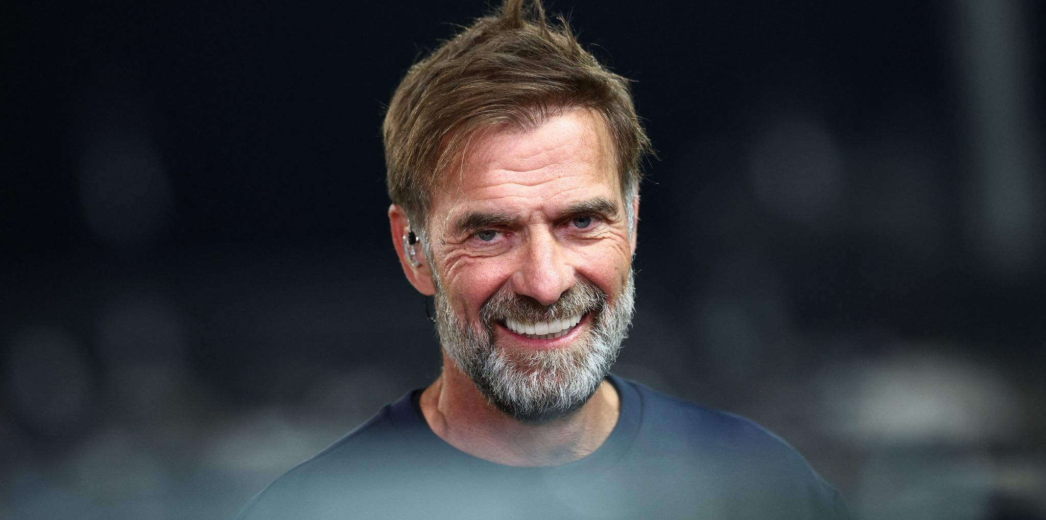 Jürgen Klopp grinst.